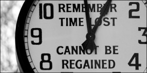 Clock with words Remember Time Lost Cannot Be Regained